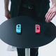 Illustration for article titled The Switchs Neon Joy-Con Point Toward Nintendos Colorful Past